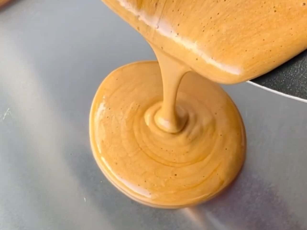 Pour sugar mixture to baking sheet
