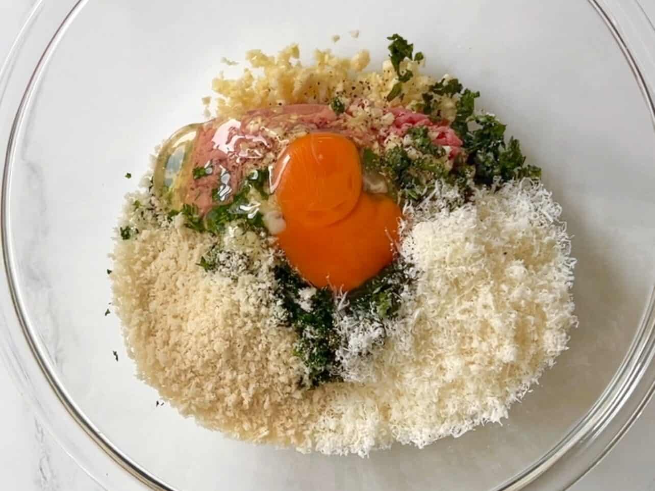 combine meatball ingredients in a large bowl