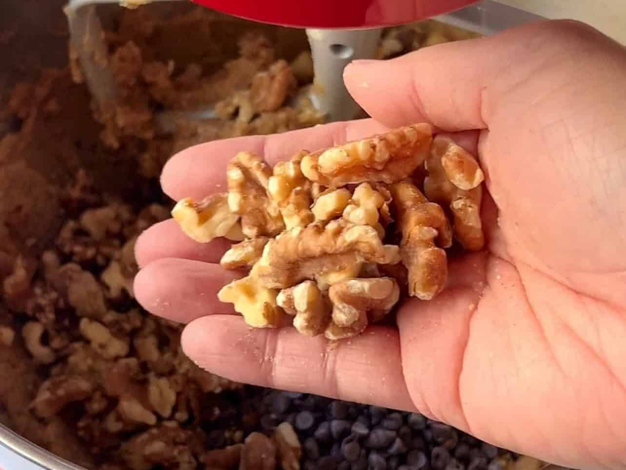 add roughly crushed walnuts to chocolate chip cookie dough