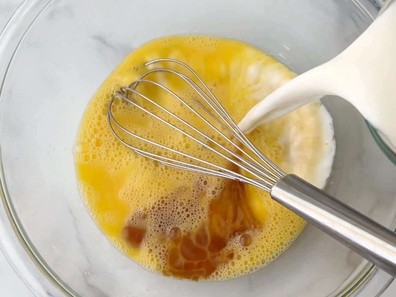 Combine egg, vanilla, and milk in a bowl