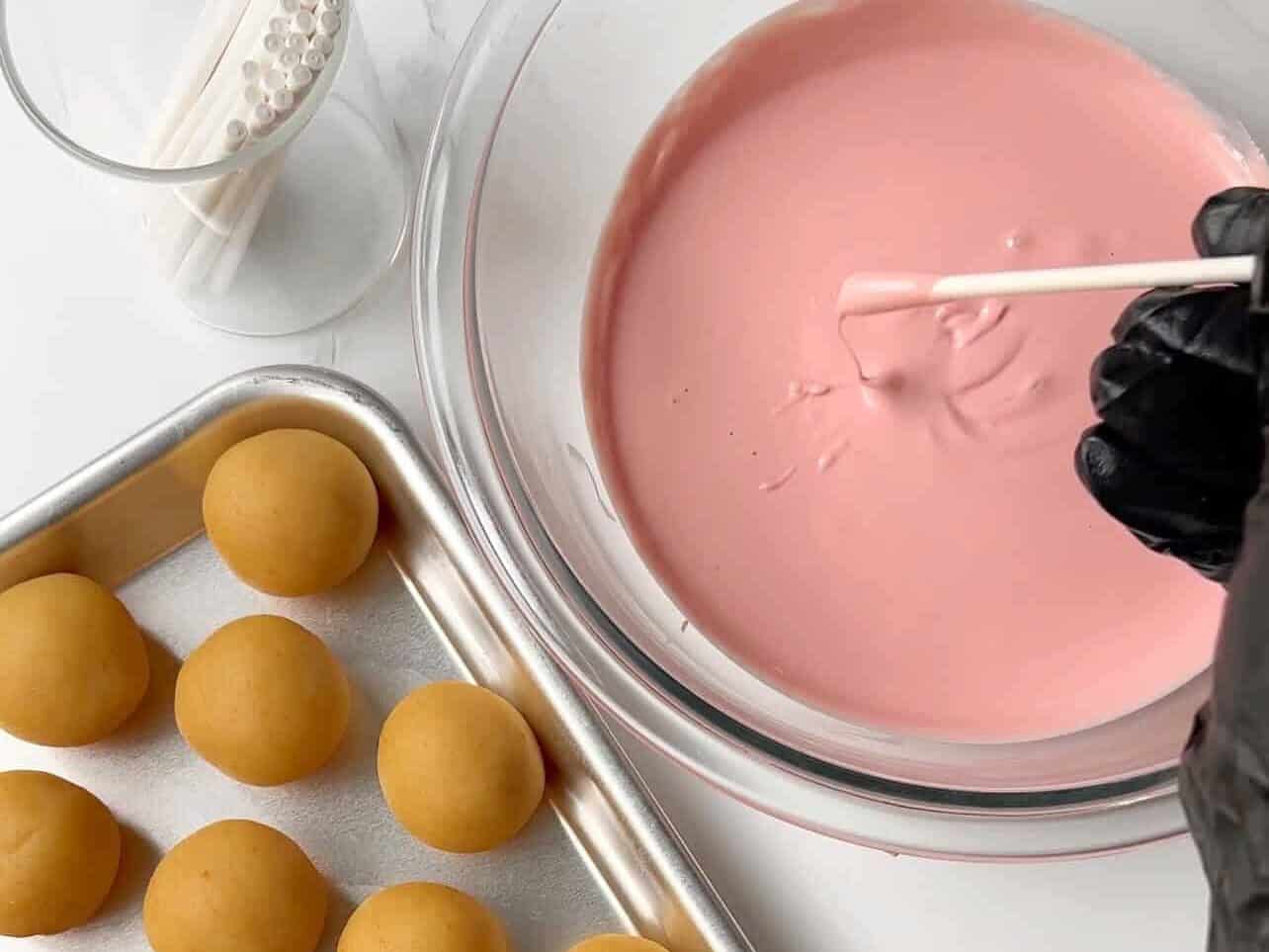 Dip sticks into melted candy melts