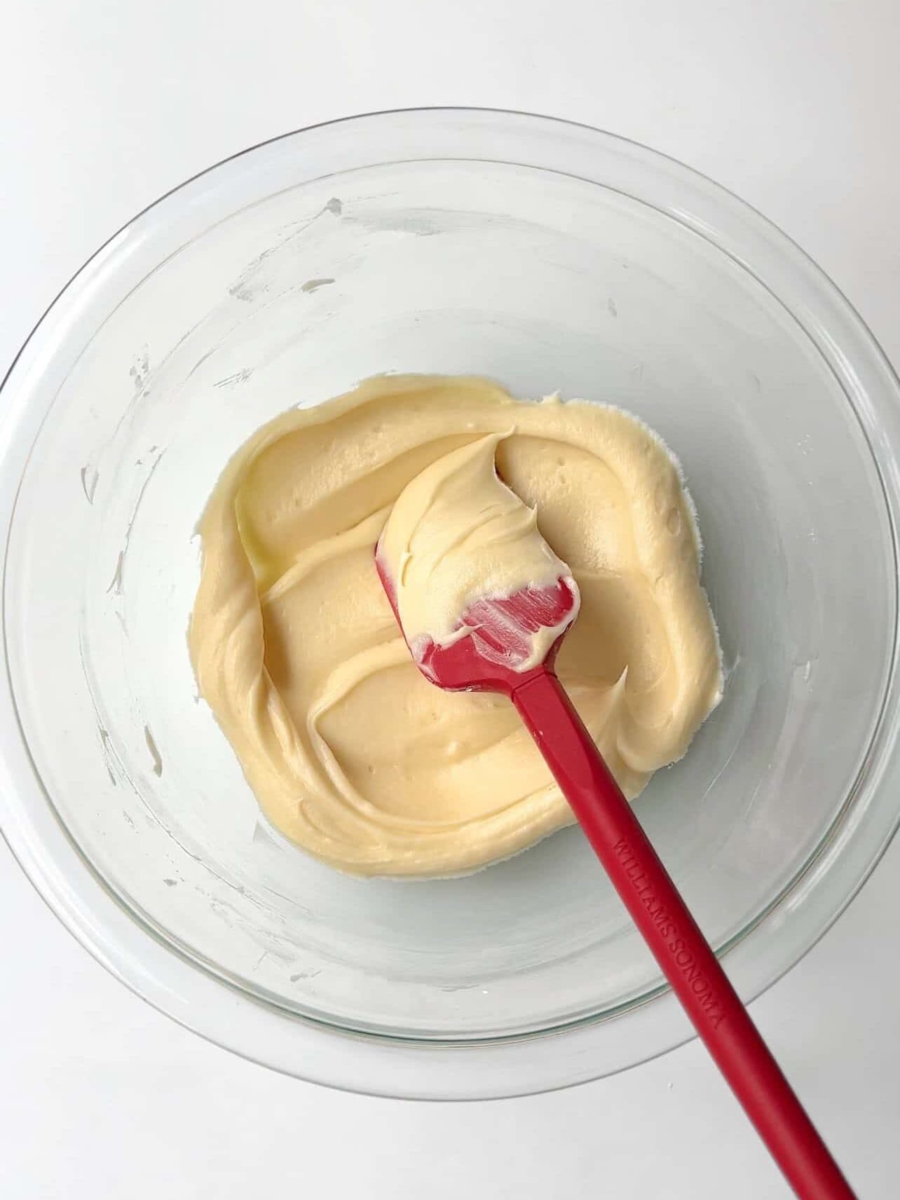 Adding quick homemade buttercream to make Starbucks copycat birthday cake pops