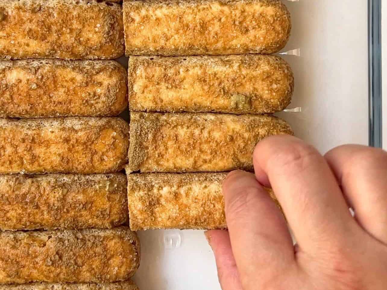 first layer of soaked pistachio ladyfingers