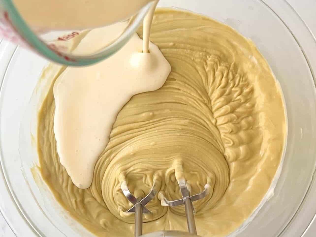 pour in heavy whipping cream into pistachio mascarpone filling