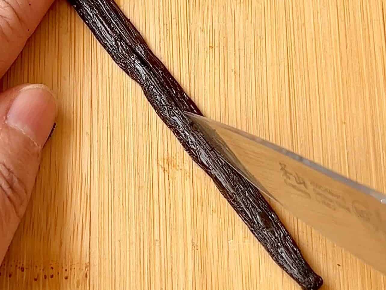 split vanilla beans lengthwise to expose seeds