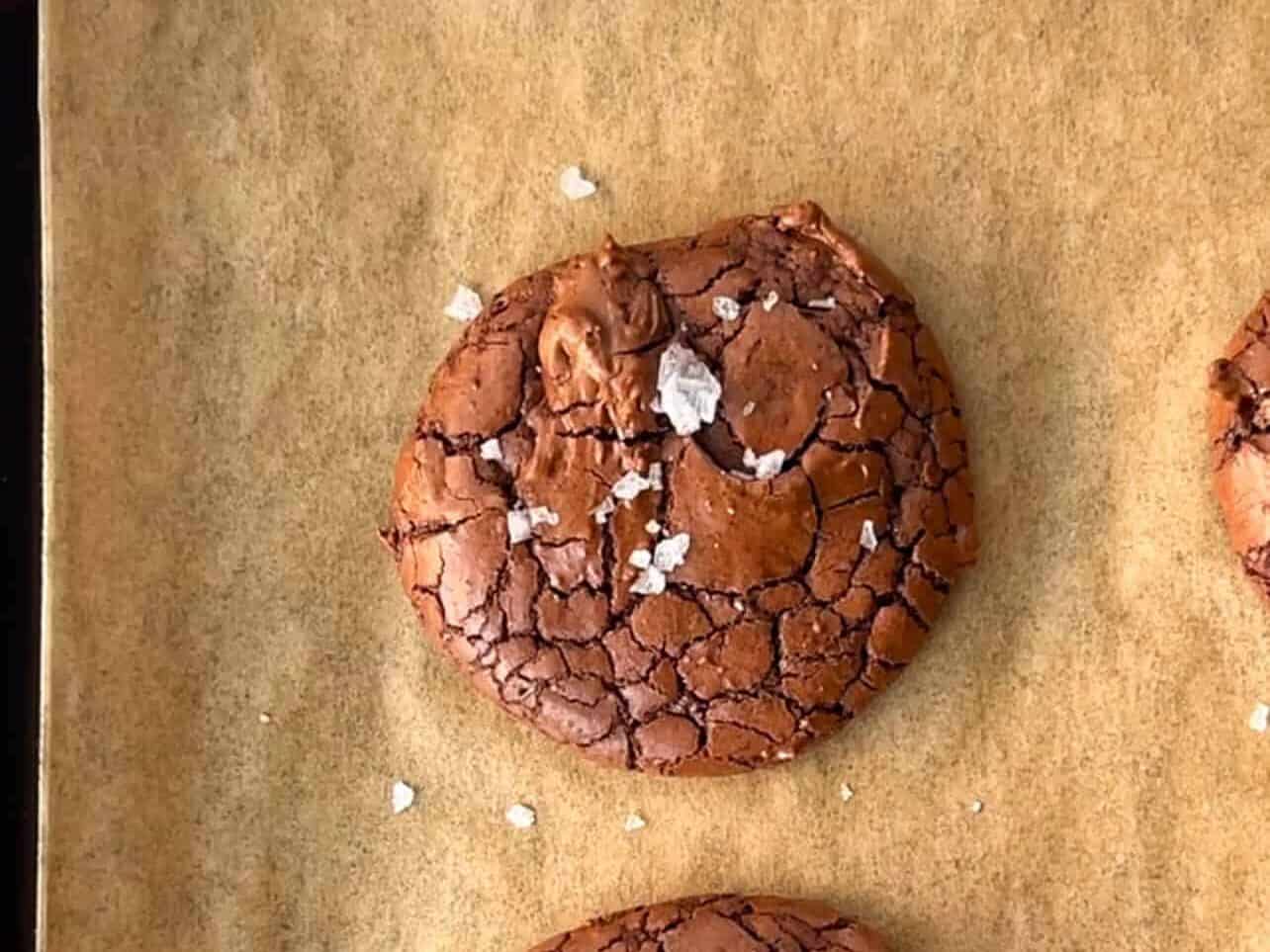 sprinkle flaky sea salt on brownie cookie