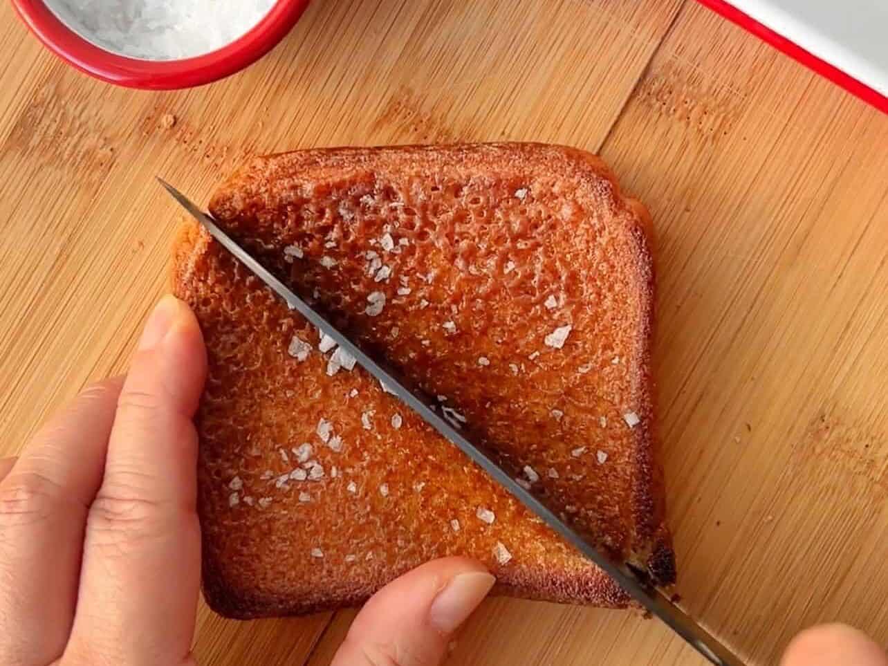 sprinkle flaky sea salt and slice cinnamon toast