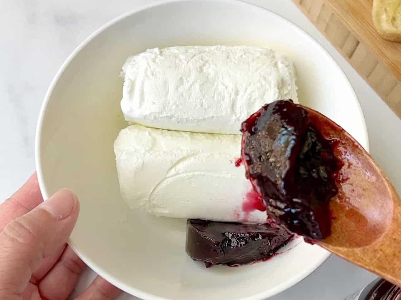 Add any flavor jam to goat cheese