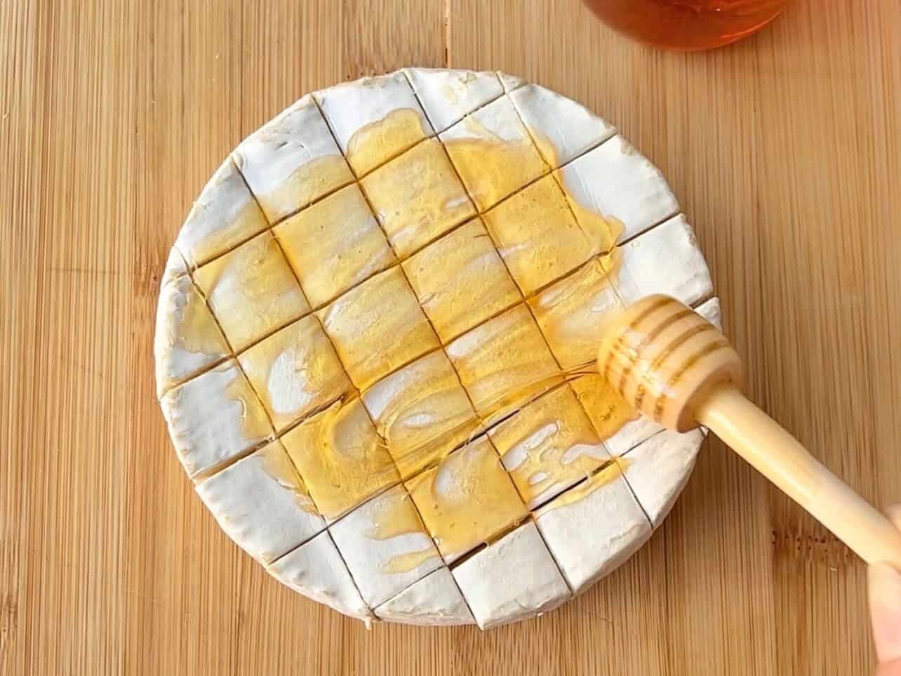add honey to scored brie