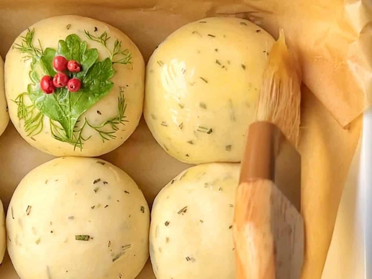 brush on honey butter to each dough