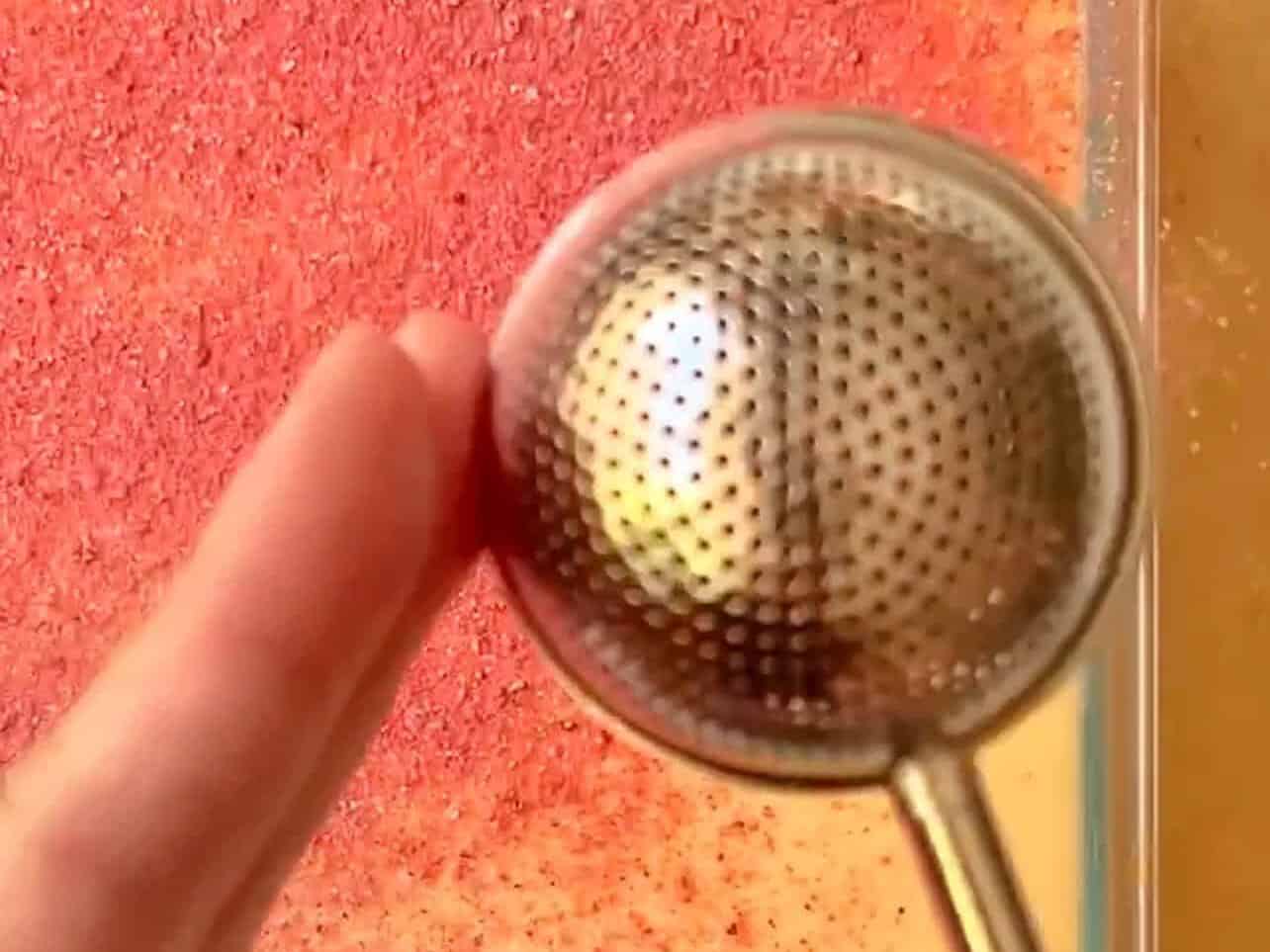 sieve strawberry sugar to decorate tiramisu