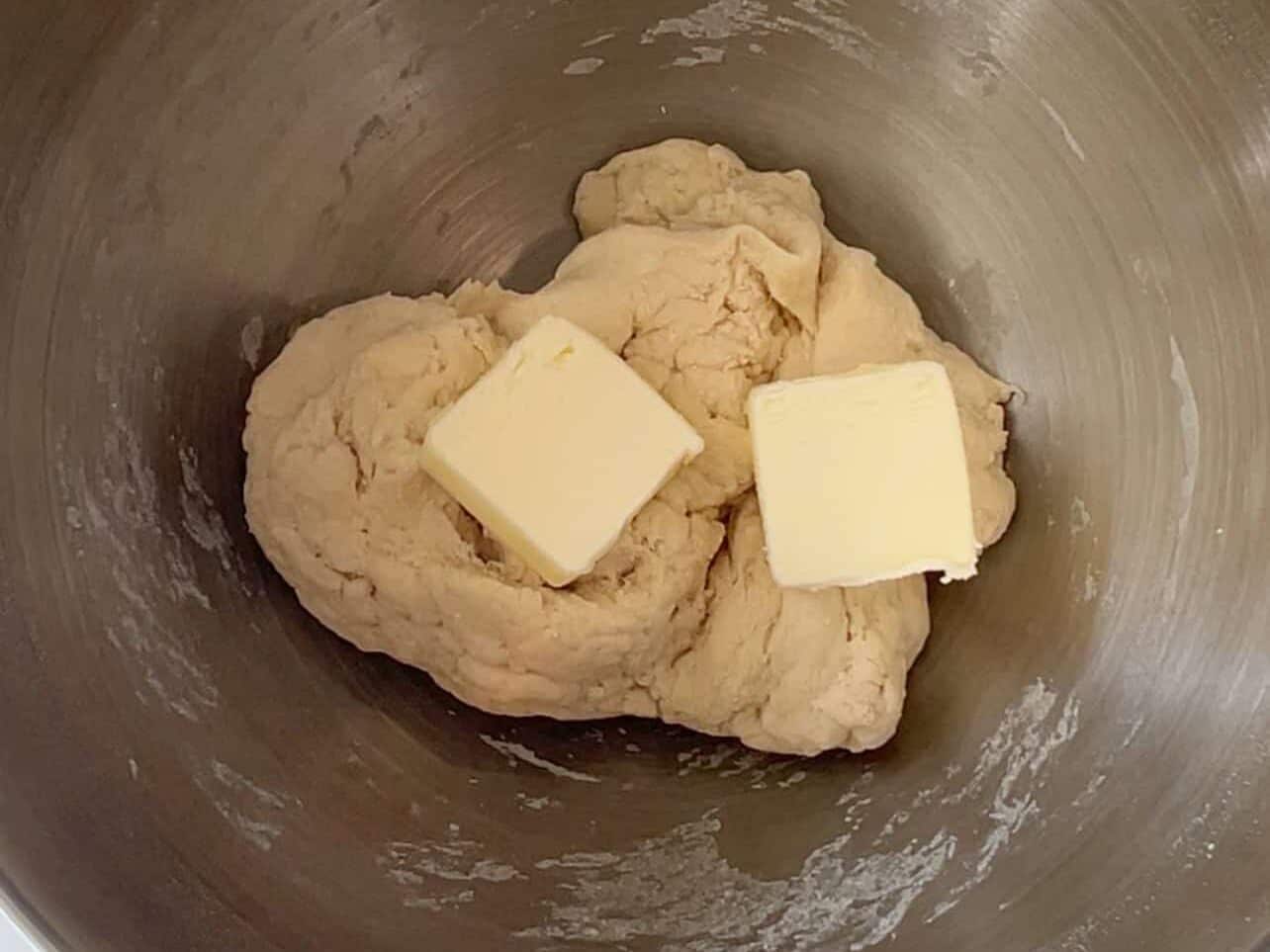 Add butter to dough