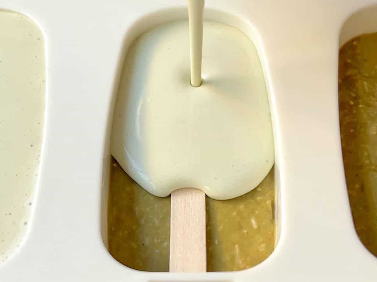 pouring melted ice cream into molds