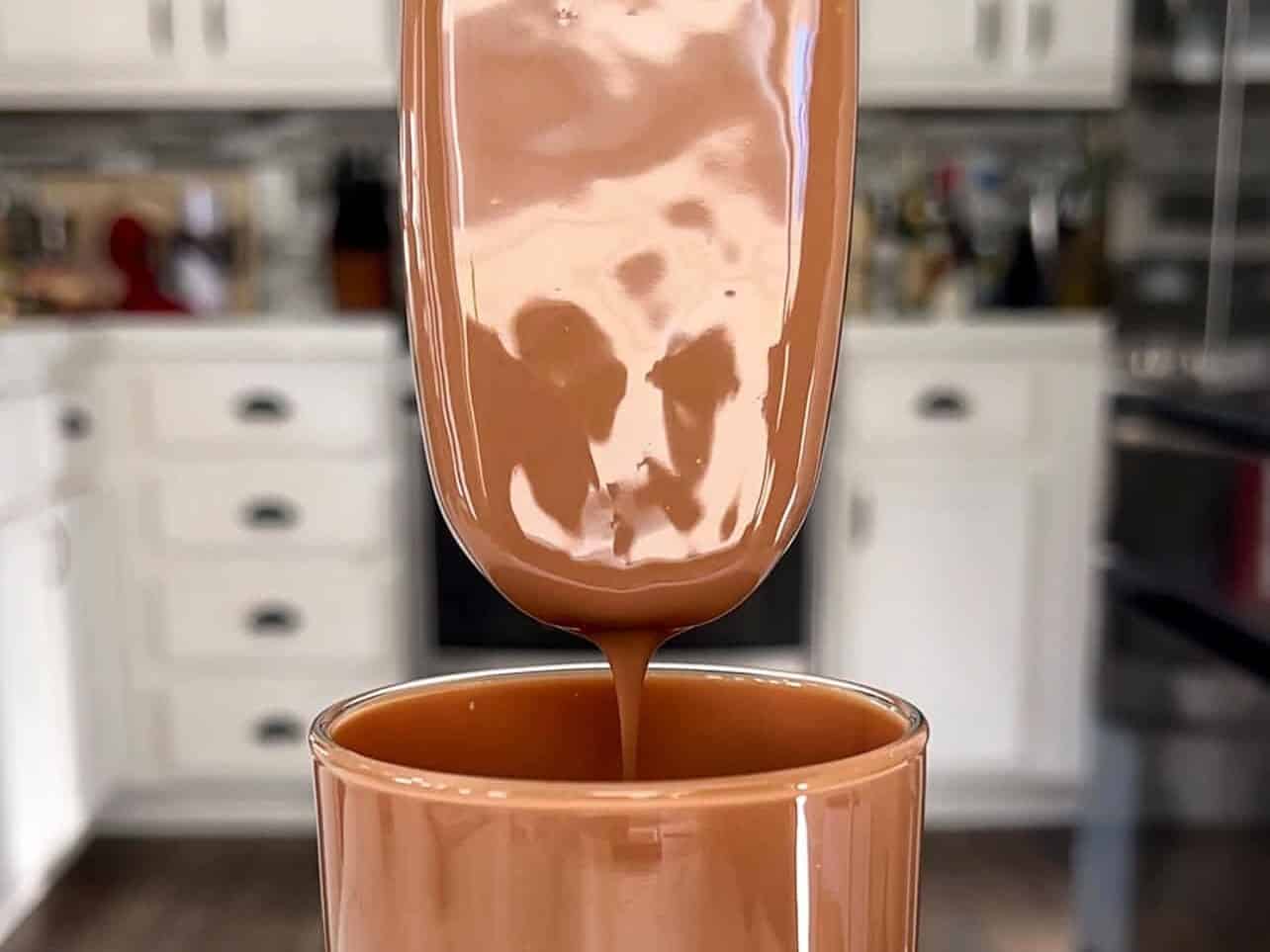 allow excess chocolate to drip off bar