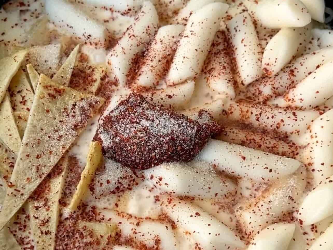 using gochujang, gochugaru, and sugar to Rosé Tteokbokki