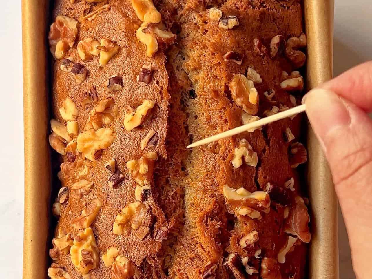 poke bread with toothpick to see if it comes out clean
