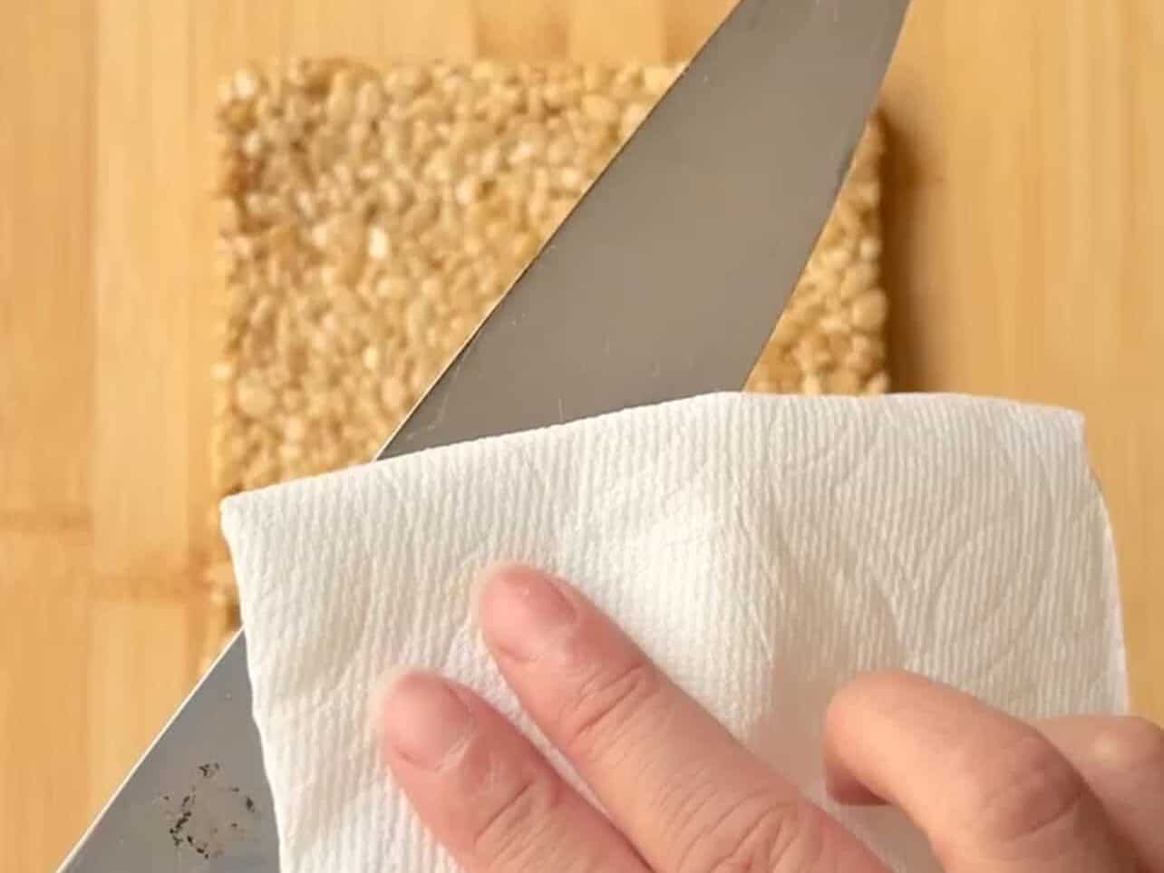 grease knife before slicing Rice Krispie treats