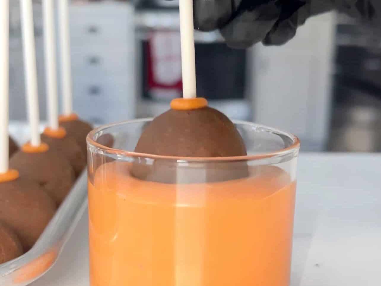 dip cake pops in candy melts