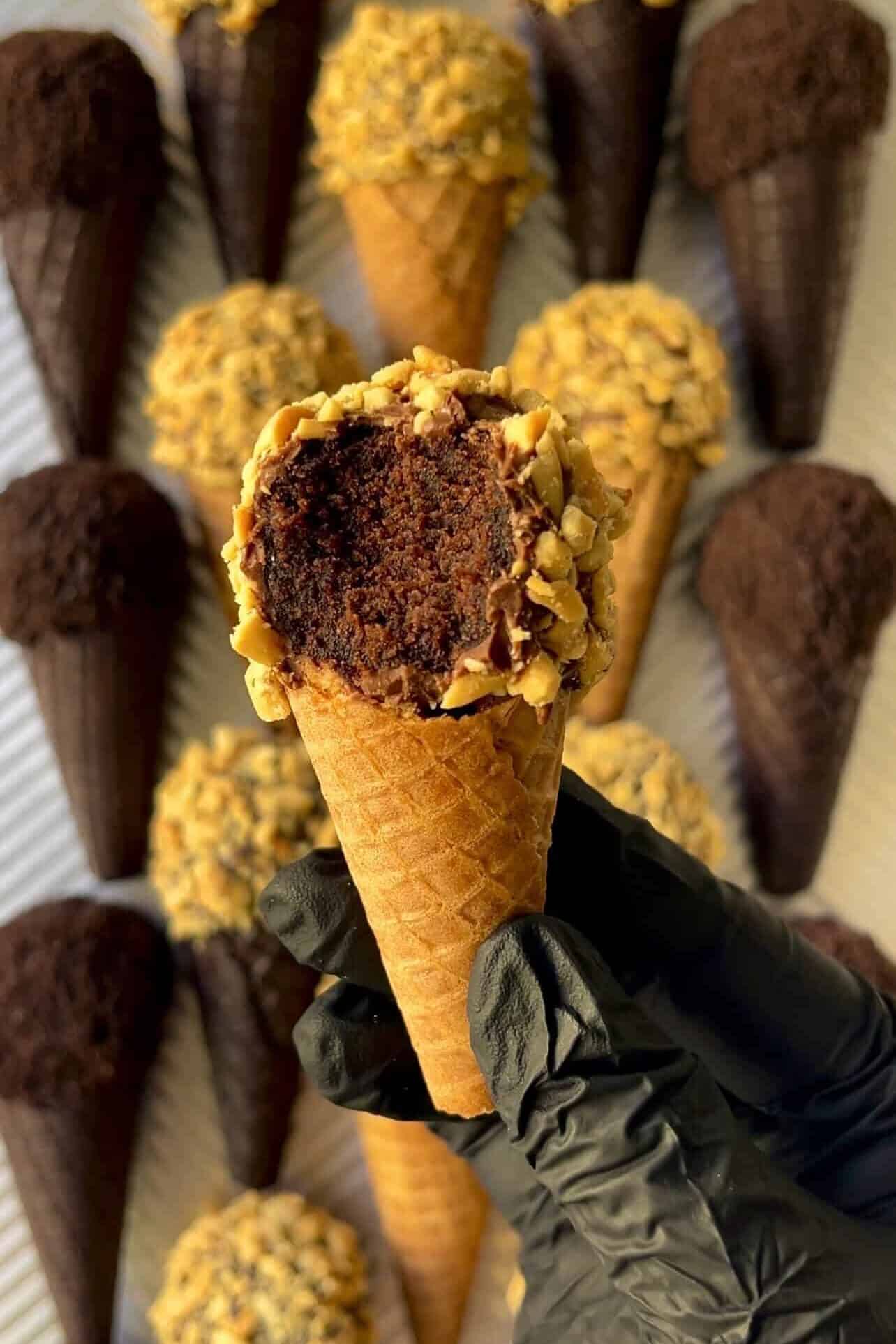 biting into "Drumstick" cake pop