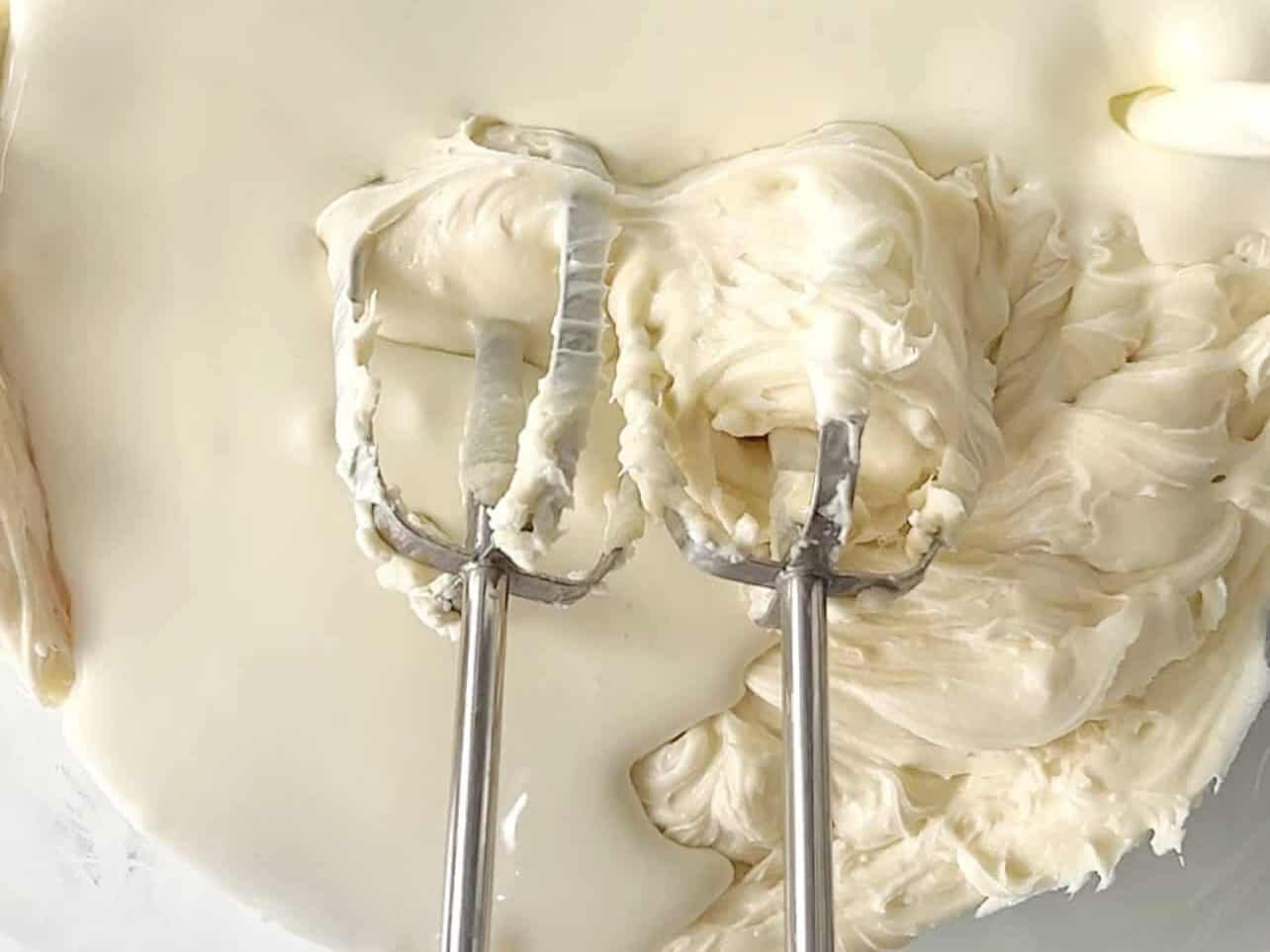whip in heaving whipping cream for cream cheese frosting