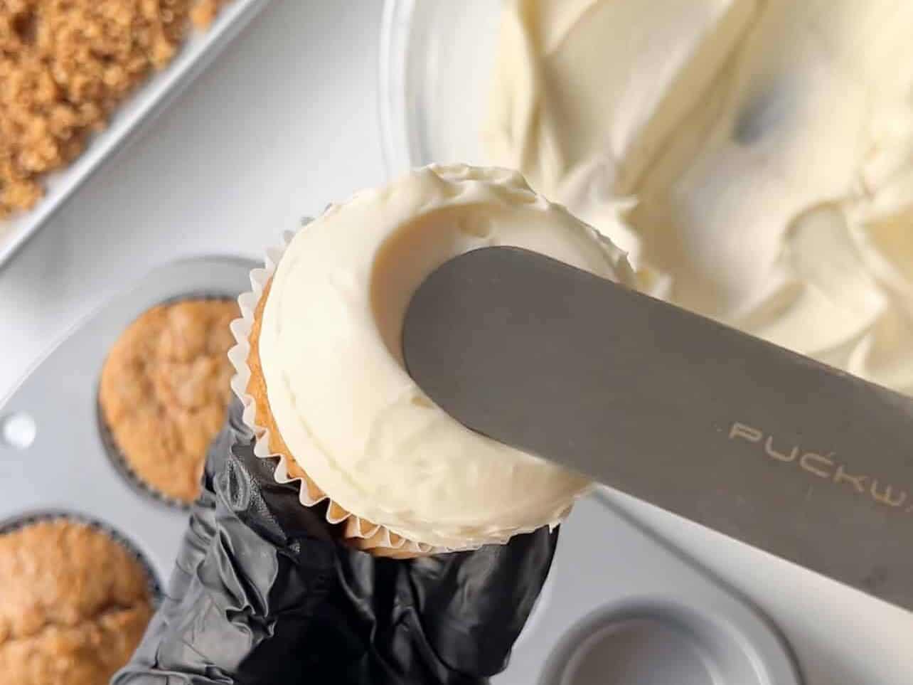 add a swirl to create a flat crater for carrot cupcake decoration