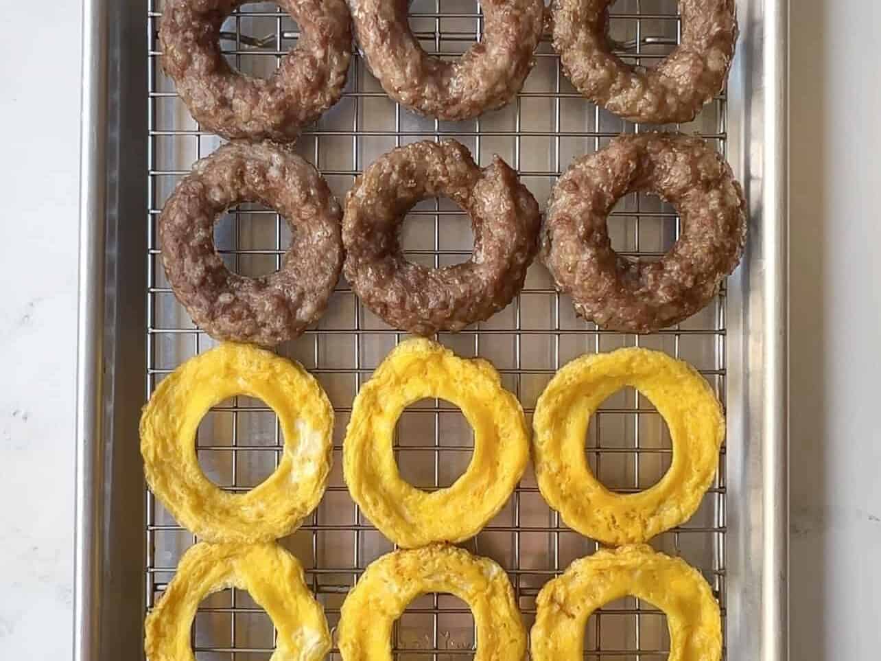 cool sausages and eggs on wire rack