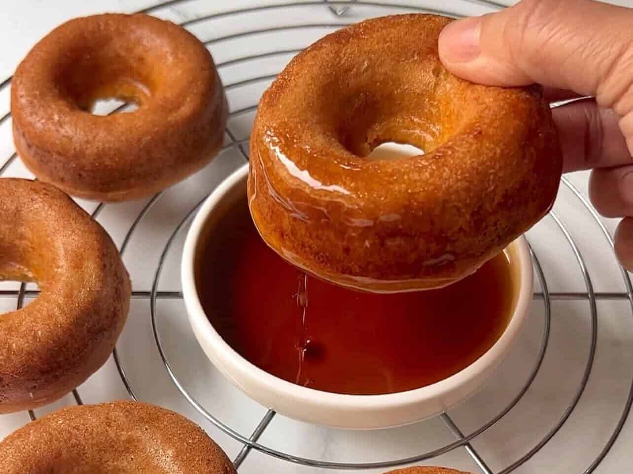 dunk breakfast donuts in maple syrup