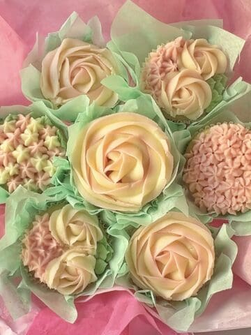 pink and white lemon raspberry cupcakes arranged as a bouquet
