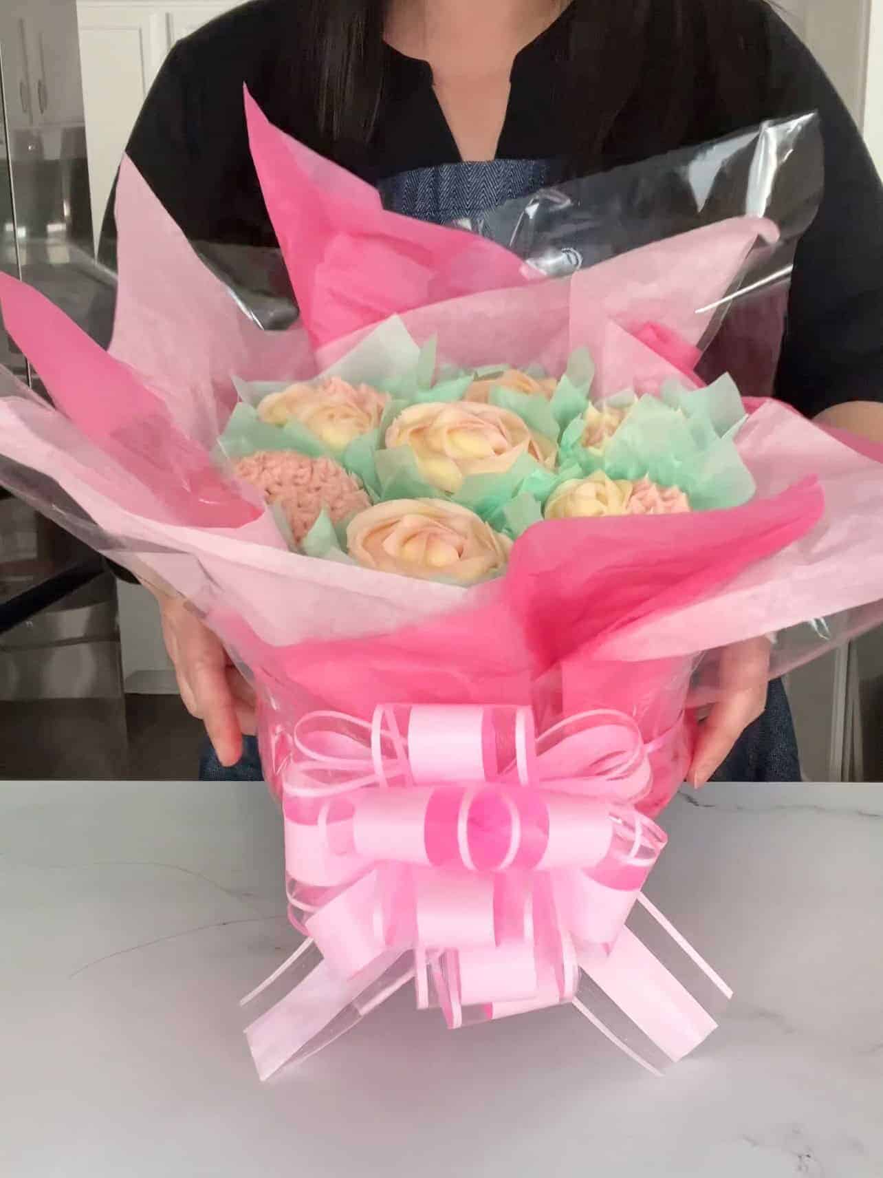 pink and white lemon raspberry cupcakes arranged in a bouquet