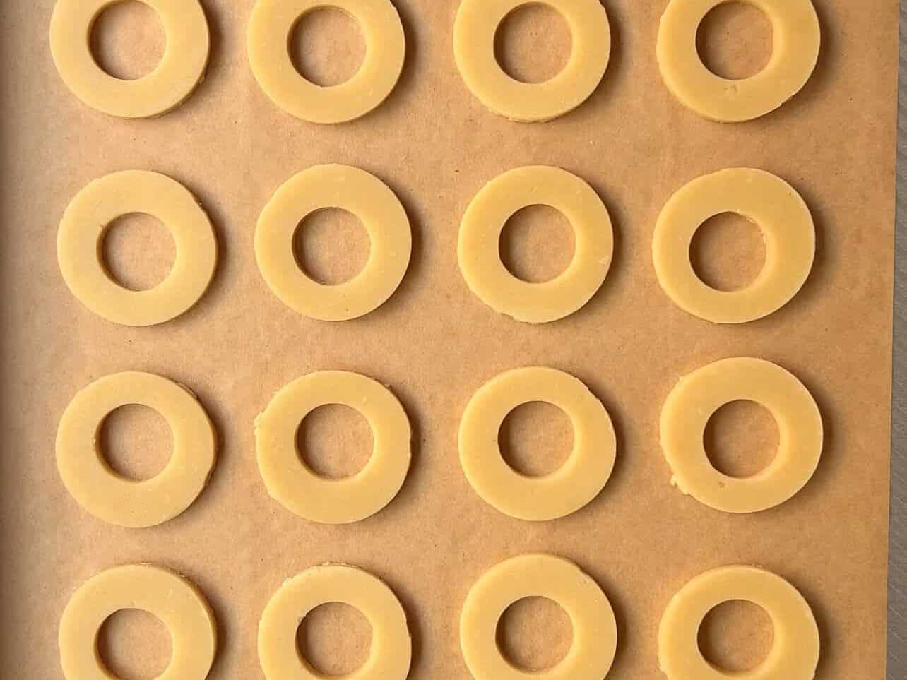cookie rings on baking sheet to make Girl Scouts copycat Samoas cookies