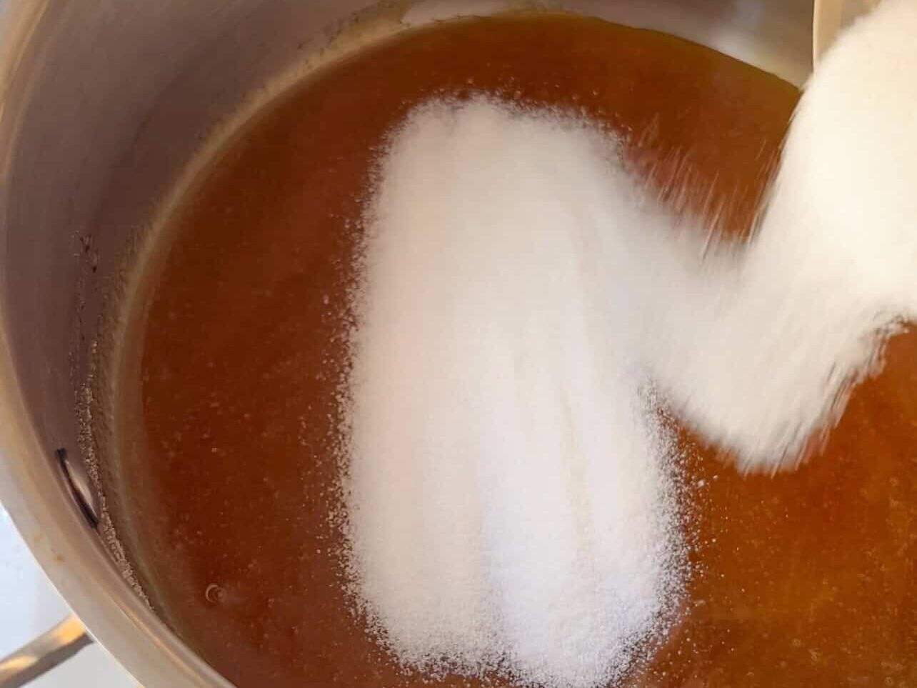 Add last remaining sugar to make caramel sauce in saucepan