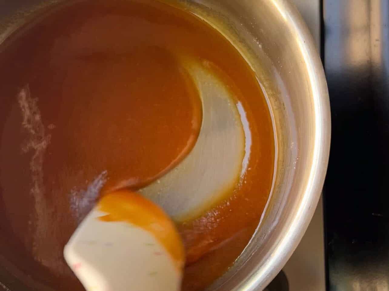 visual cues for making caramel - melting sugar turning amber color and becoming less grainy