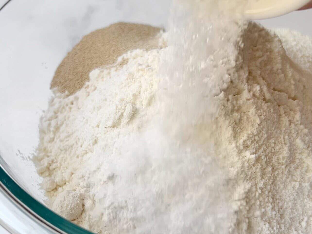 add yeast and salt in separate spots of mixing bowl so salt does not kill yeast