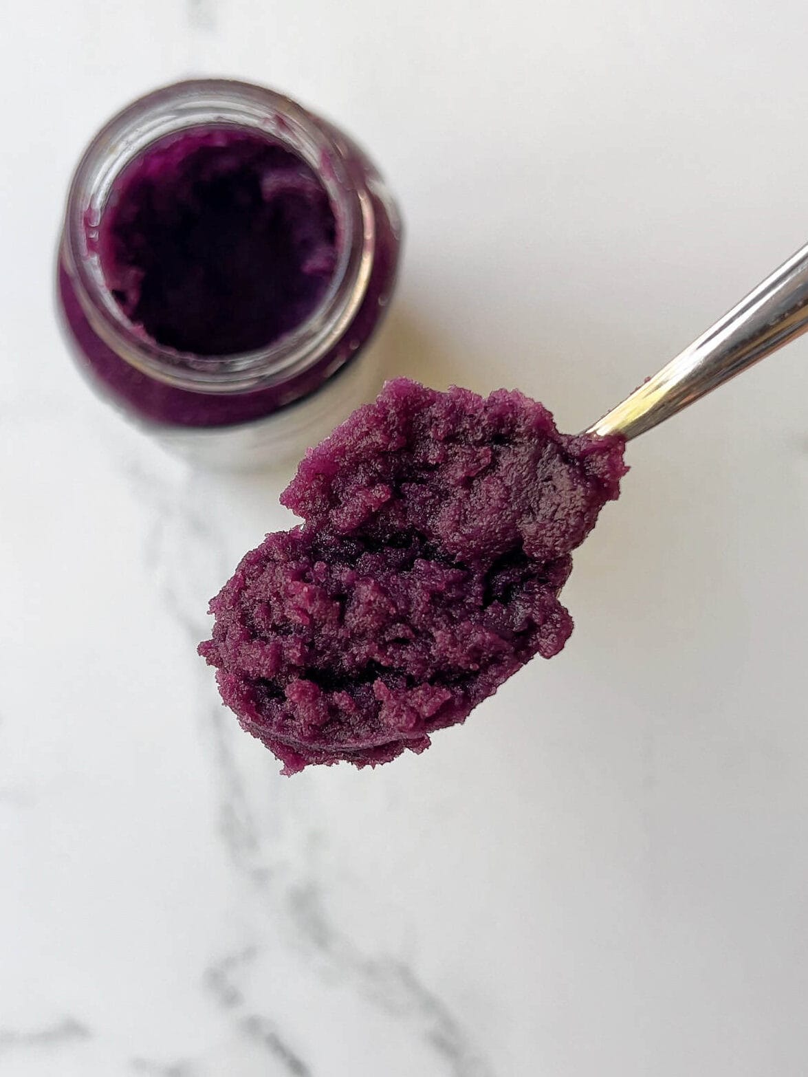 texture of ube jam in a spoon