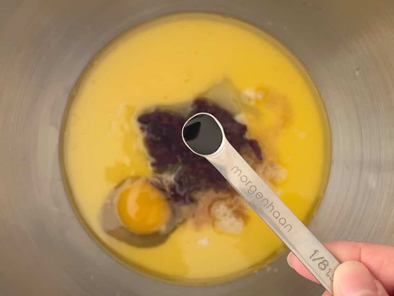 adding a tiny bit of ube extract to ube coconut sweet rolls recipe