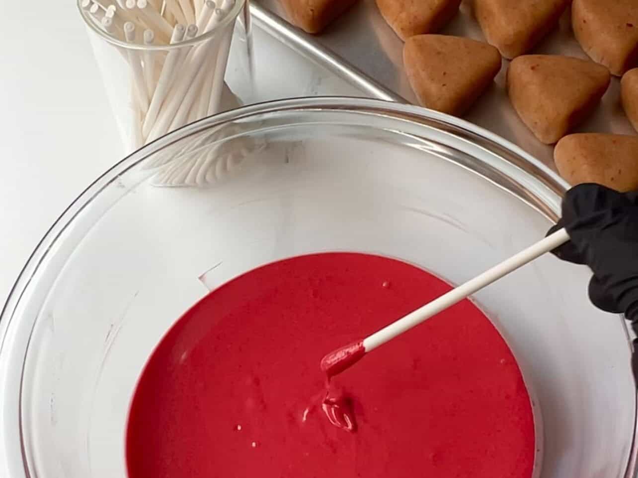 dip tip of sticks into melted candy melt to attach to cake pops