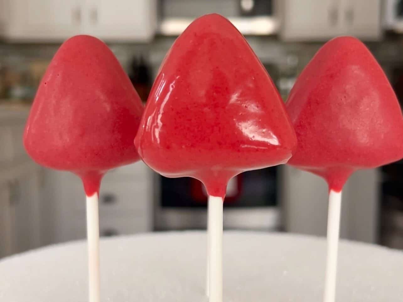 use styrofoam block to keep cake pops upright as coating dries