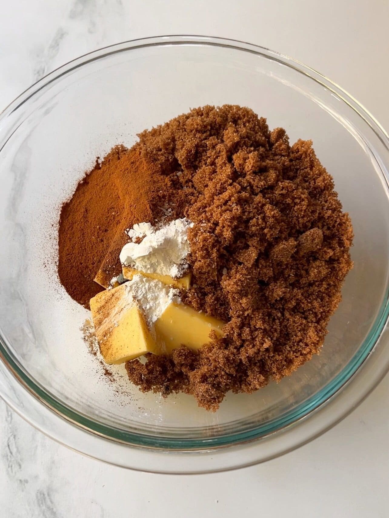 adding cornstarch to cinnamon roll filling helps prevent leakage in pan when baked