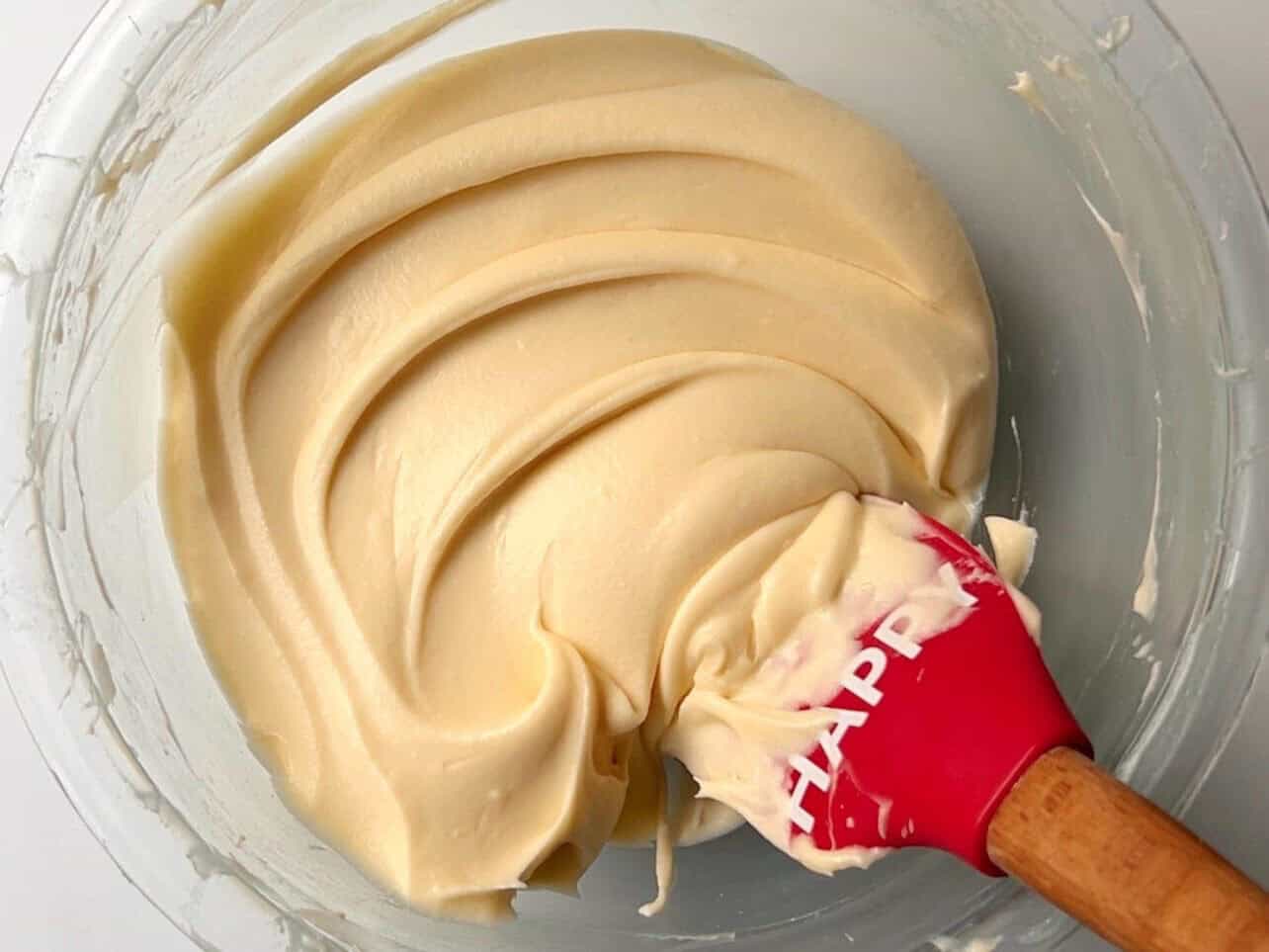 mixing cinnamon roll frosting on low speed to produce silky rich frosting texture